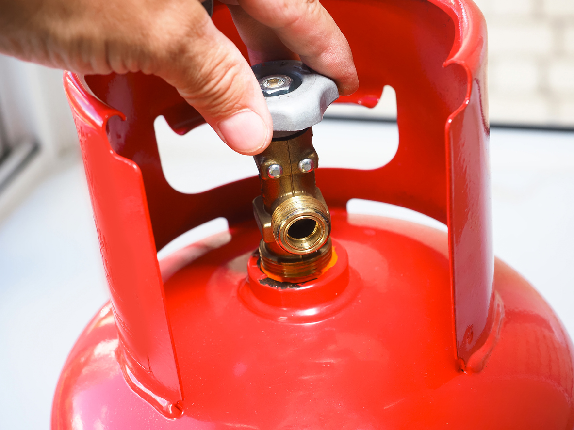 red gas metal container propane ballon